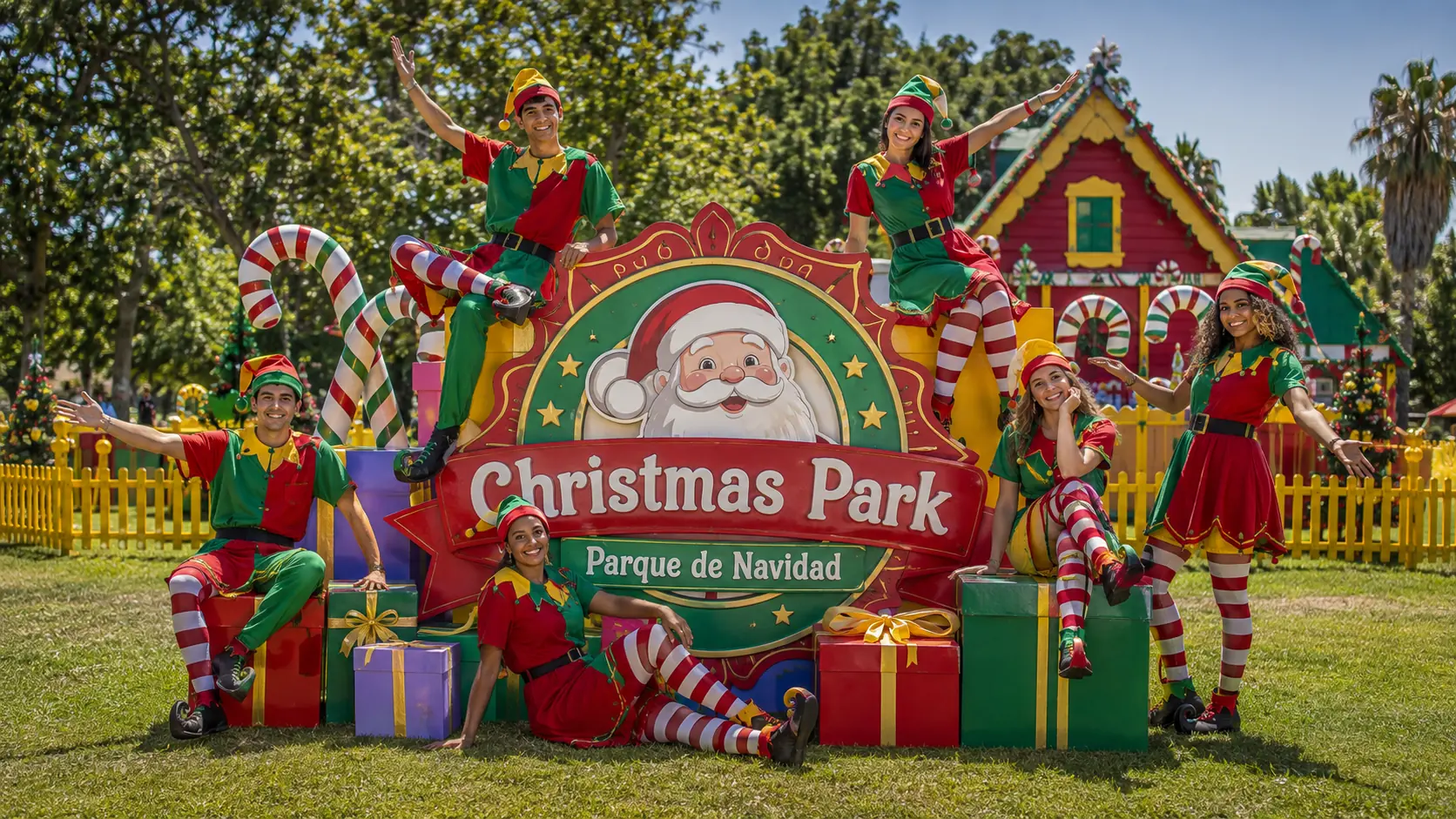 Elenco junto al gran símbolo del Parque de Navidad